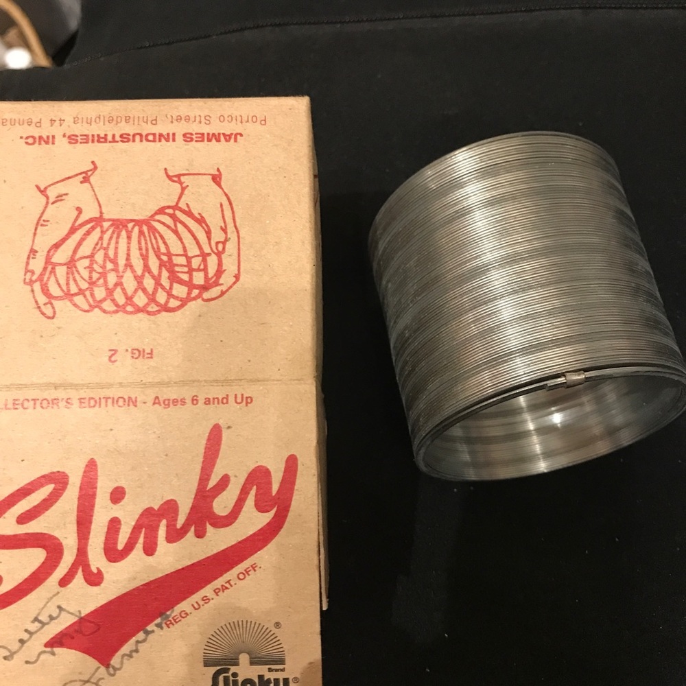 Vintage  SLINKY with rare Collectible signature NEW